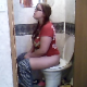 A pudgy, nerdy girl wearing glasses takes a shit while sitting on a toilet and wipes her ass. Audible plops. Decent video, although frame rate is slightly slower. About 4.5 minutes.
